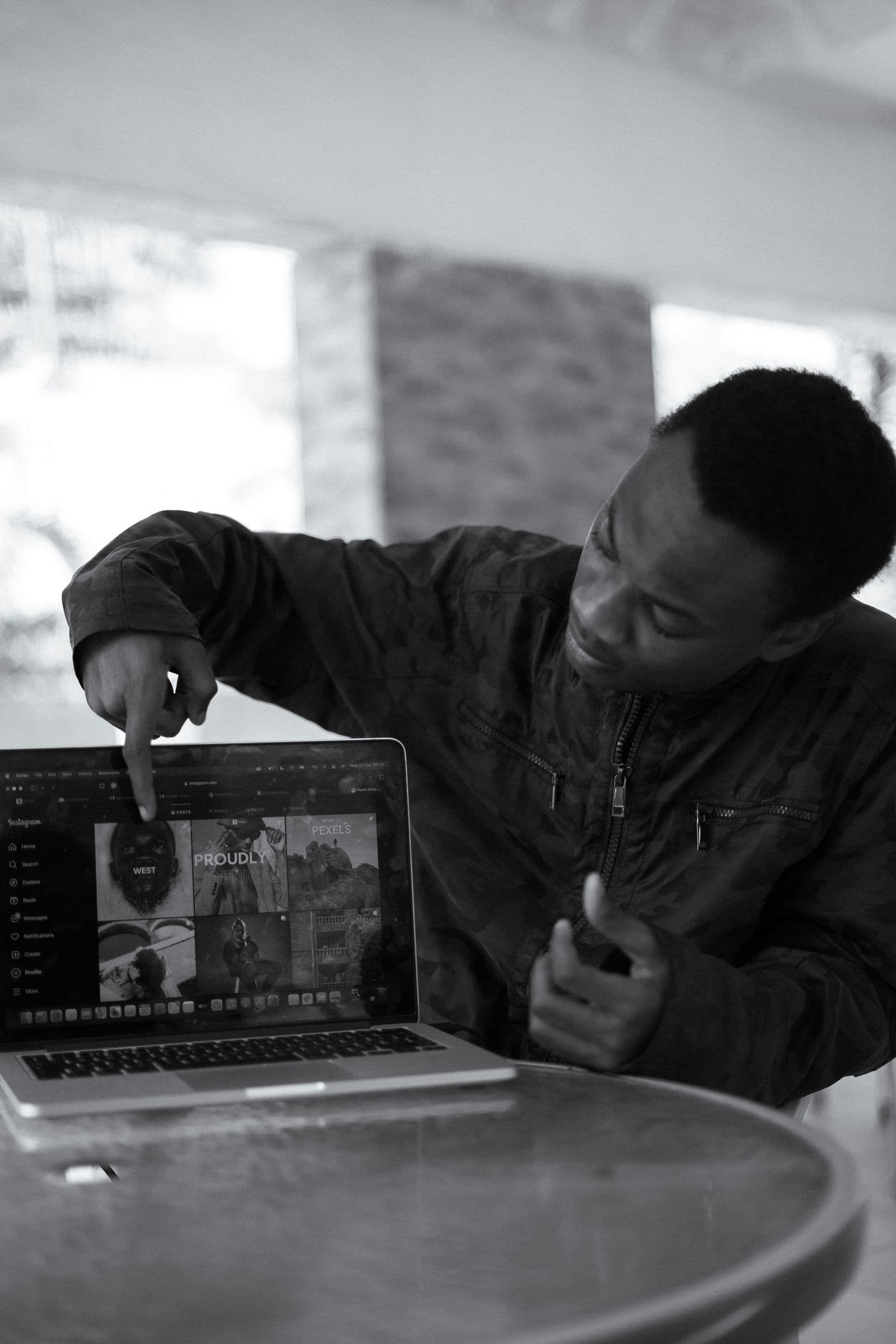 A member of the AlaRide community working through a project on a laptop
